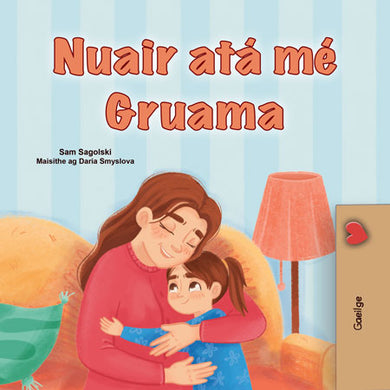 Book cover with a woman and child hugging, titled 'Nuair at¡ mé Gruama' on a blue striped background.